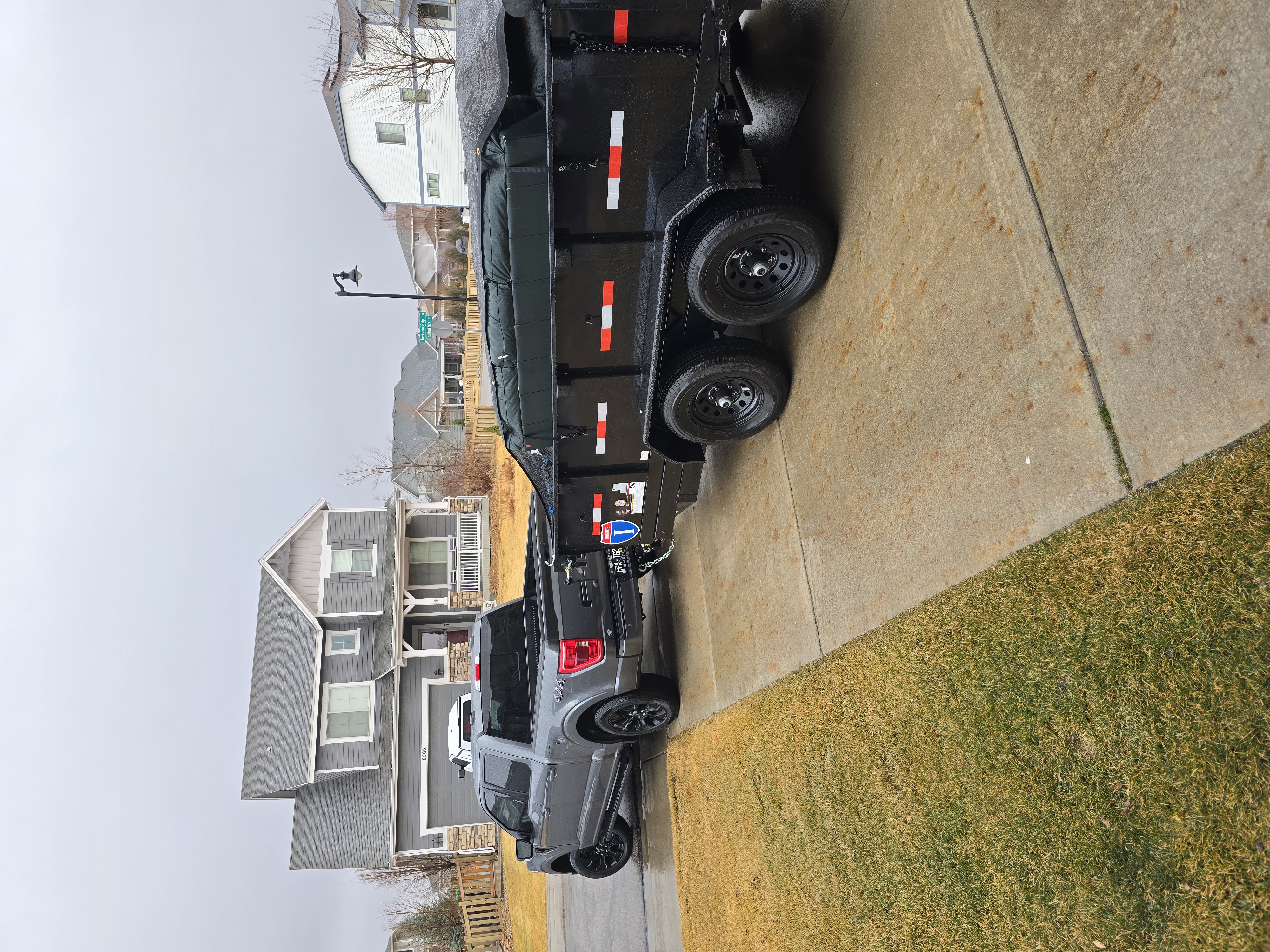 Loaded trailer full of junk hauled away in Northern Colorado