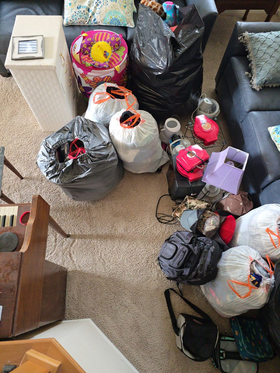Bagged belongings and items staged for removal in Northern Colorado