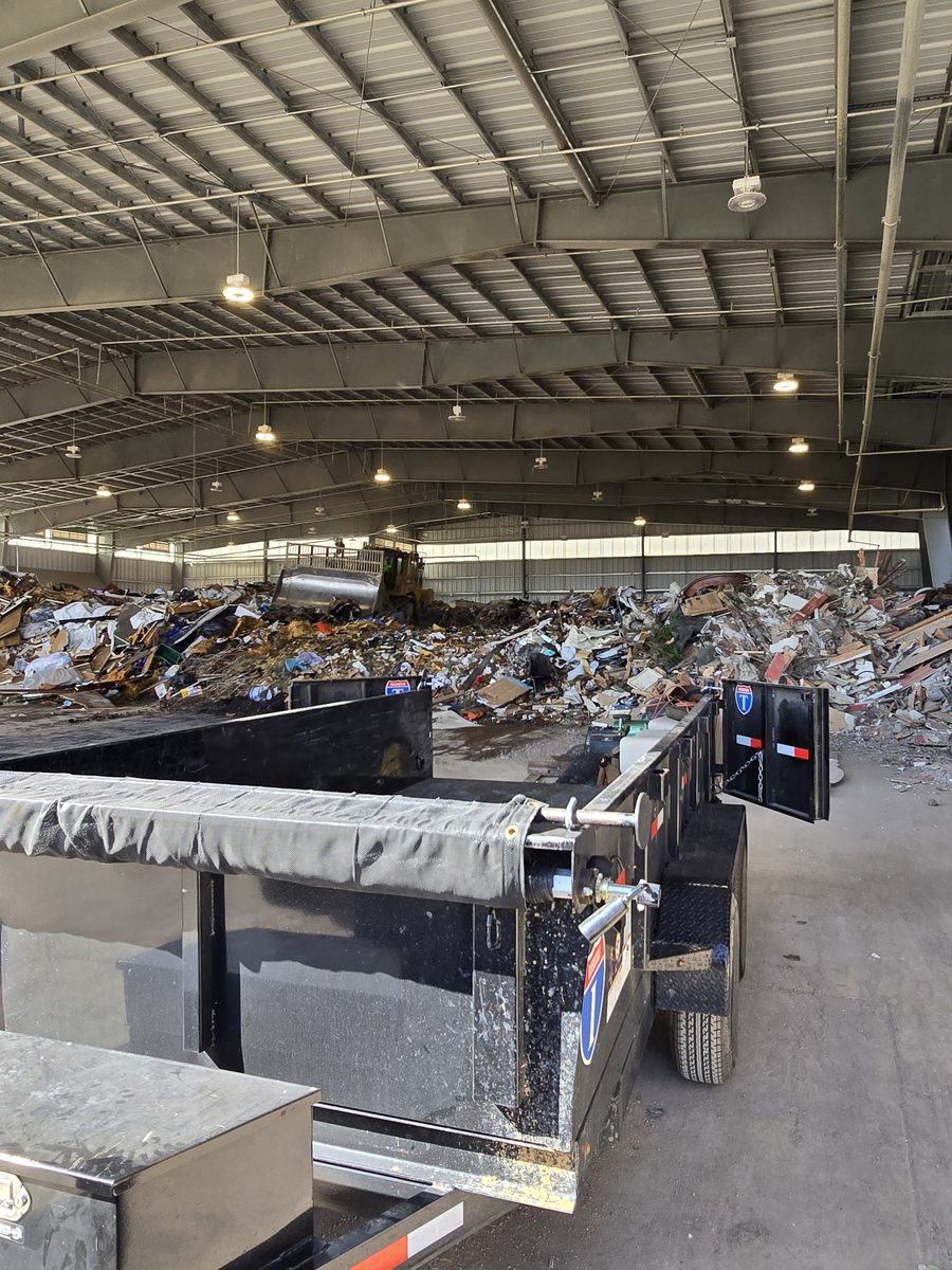 Dump trailer unloading debris at a transfer station in Northern Colorado