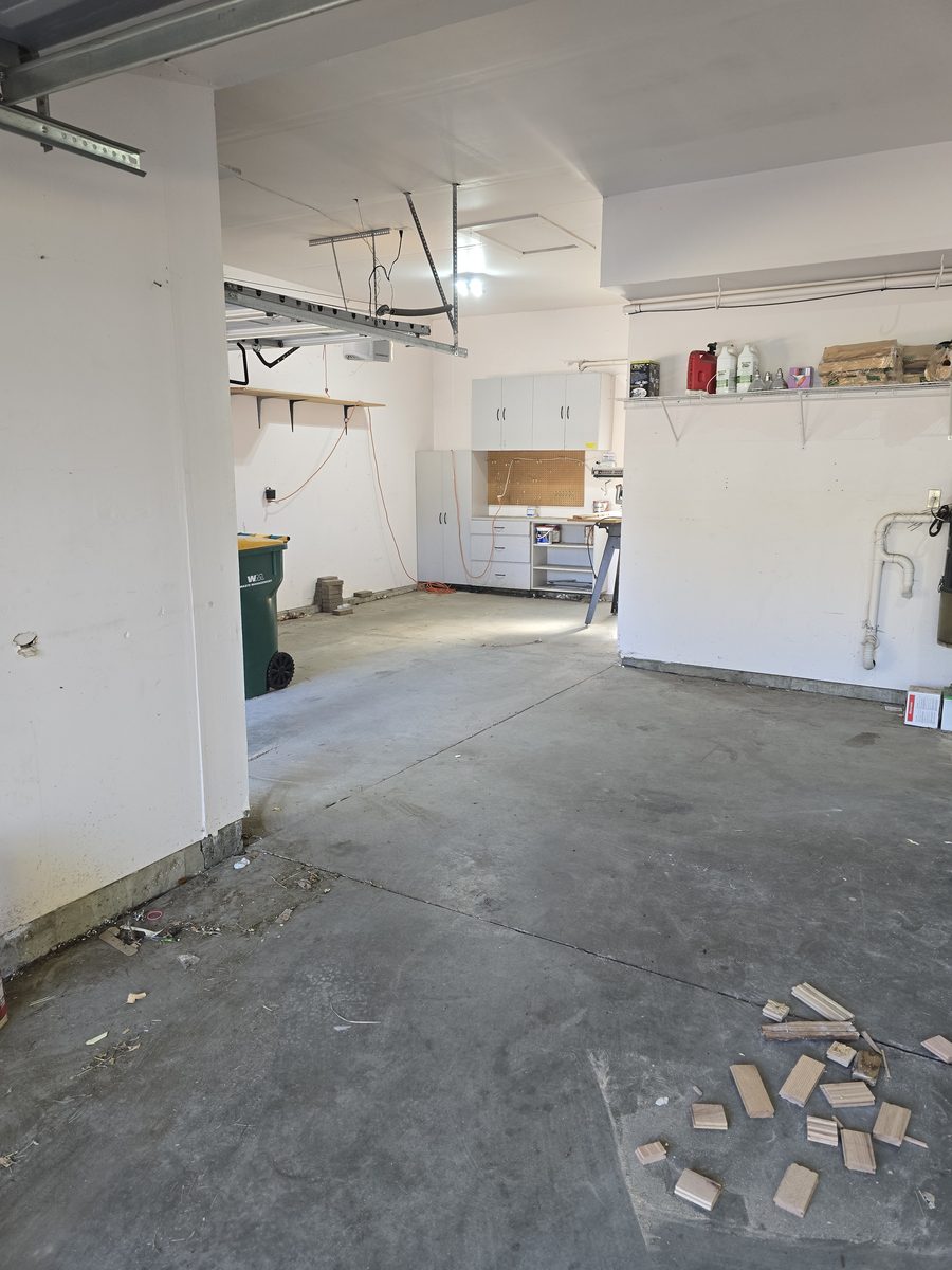 Garage storage area fully cleared after junk removal in Northern Colorado