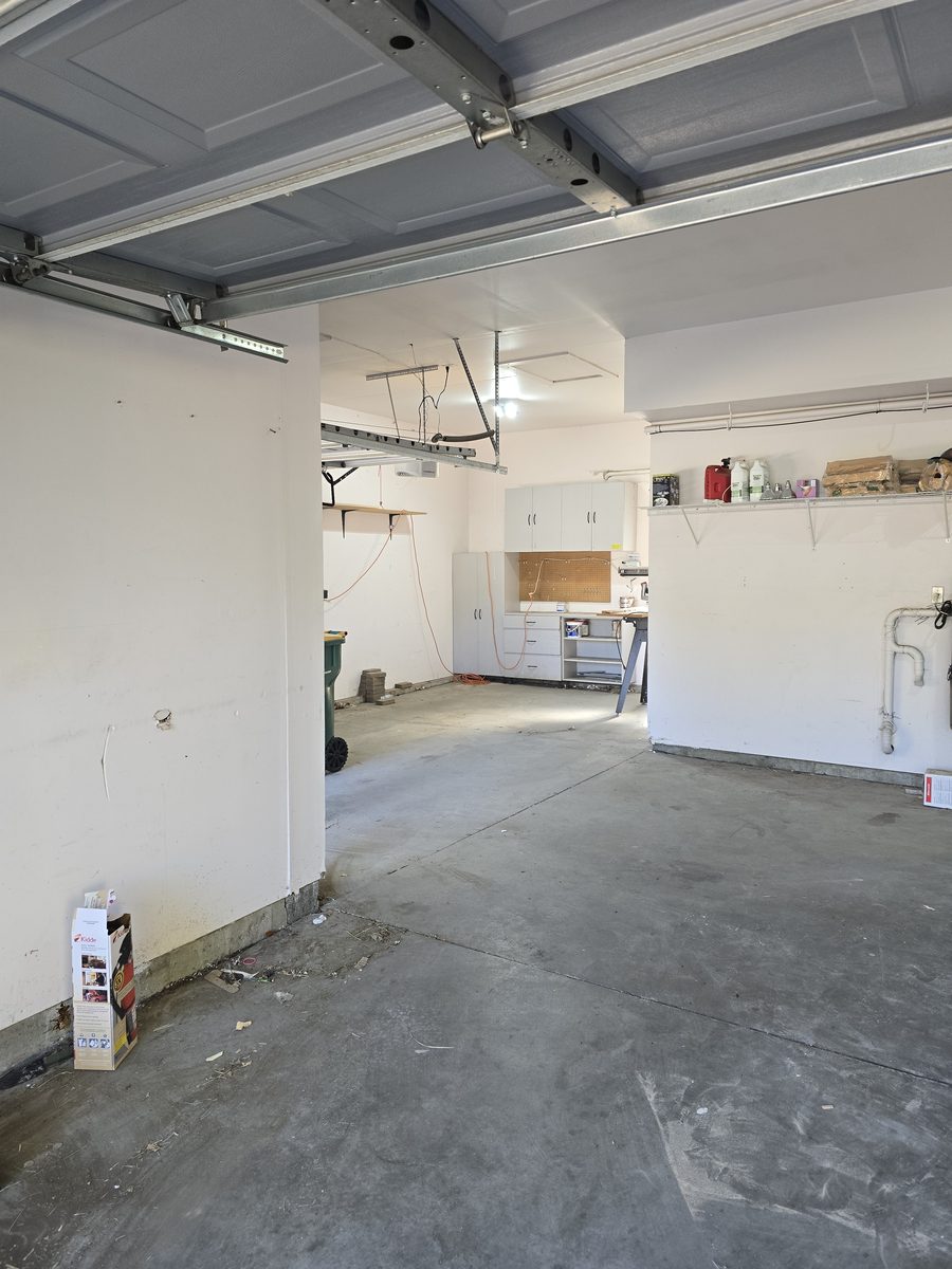 Garage workbench area fully cleared after junk removal in Northern Colorado