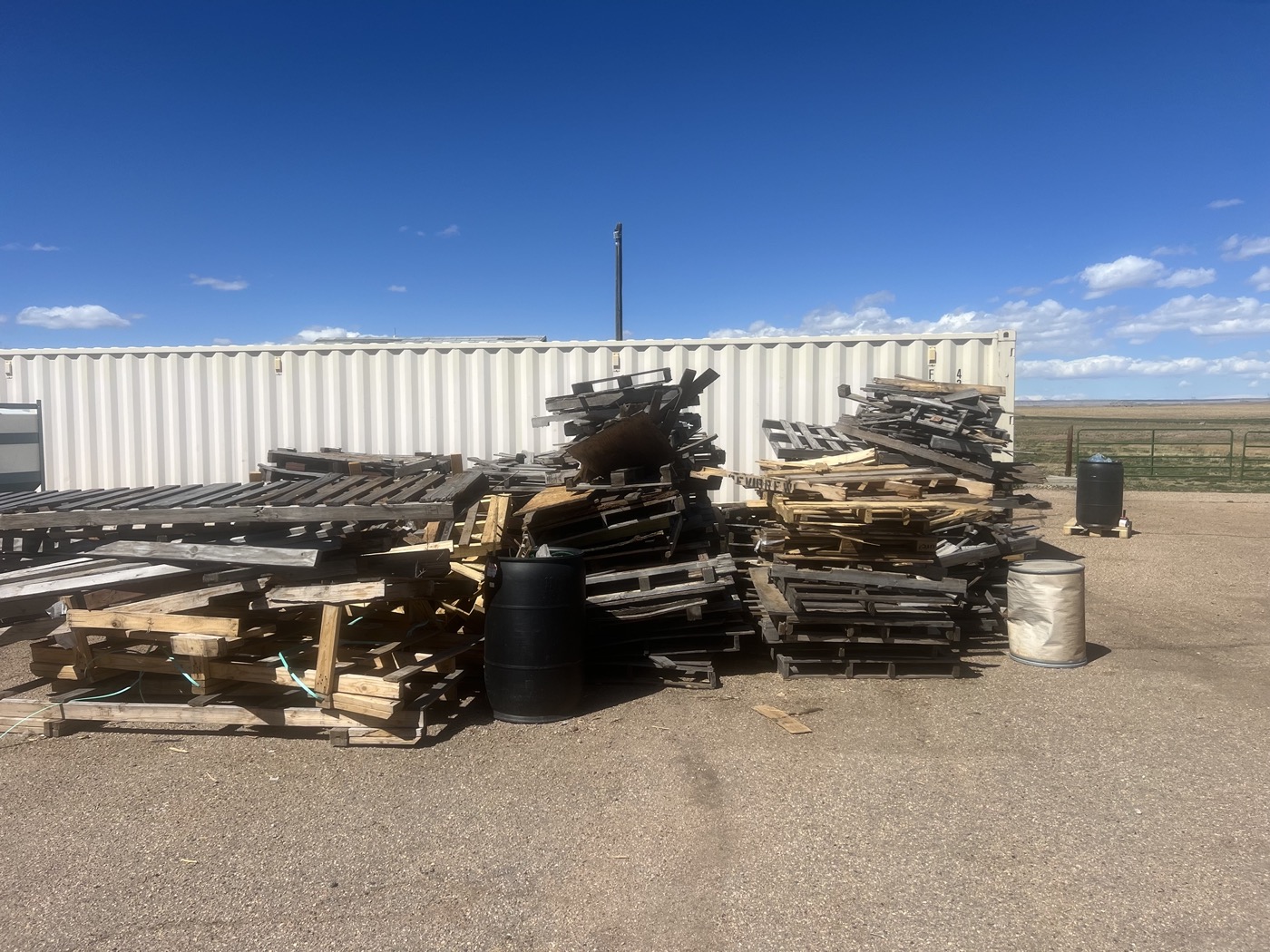 Scrap wood and pallet debris before junk removal in Northern Colorado