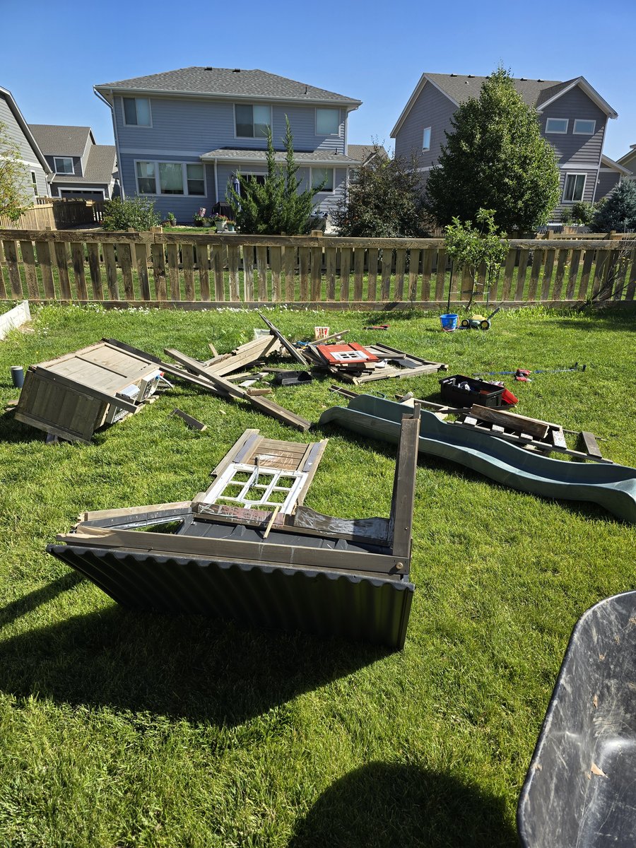 Wooden playset dismantled and ready for haul-away in Northern Colorado